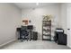 Office space featuring a desk with multiple monitors and a trophy display shelf at 2436 Hidden Creek Road, Kennesaw, GA 30152