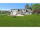 Expansive backyard with a gazebo, patio, and mature trees at 3880 Dial Mill Ne Rd, Conyers, GA 30013