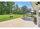 Backyard featuring a gazebo and spacious concrete patio at 3880 Dial Mill Ne Rd, Conyers, GA 30013