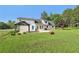 Spacious backyard featuring a patio, gazebo, and fenced perimeter at 3880 Dial Mill Ne Rd, Conyers, GA 30013