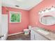This bathroom features granite countertops, a toilet, and a tub with shower at 3880 Dial Mill Ne Rd, Conyers, GA 30013