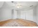 Bedroom has a ceiling fan, window, and closet at 3880 Dial Mill Ne Rd, Conyers, GA 30013