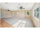 Expansive bonus room boasting lots of natural light, neutral walls, and a carpeted area at 3880 Dial Mill Ne Rd, Conyers, GA 30013