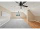 Bonus room features neutral paint, window, carpet and hard wood floors at 3880 Dial Mill Ne Rd, Conyers, GA 30013