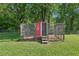 Backyard chicken coop featuring an enclosure with a door that reads 'farm fresh eggs' at 3880 Dial Mill Ne Rd, Conyers, GA 30013
