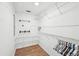 Walk-in closet featuring wood floors and wire shelving for optimal storage solutions at 3880 Dial Mill Ne Rd, Conyers, GA 30013