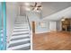 Foyer with an open floor plan, a staircase and light gray paint at 3880 Dial Mill Ne Rd, Conyers, GA 30013
