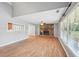 View of the open living room with fireplace, and kitchen access at 3880 Dial Mill Ne Rd, Conyers, GA 30013