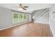 Bright living room boasts large windows and a staircase to the upper level at 3880 Dial Mill Ne Rd, Conyers, GA 30013
