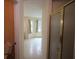 Bathroom view featuring a shower with glass doors, providing a clean and modern showering space at 5665 Stewart Woods Dr, Douglasville, GA 30135