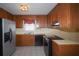 Spacious kitchen featuring stainless steel refrigerator, modern appliances, and ample cabinet space at 5665 Stewart Woods Dr, Douglasville, GA 30135