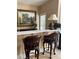 Charming bar area featuring bar stools, a countertop, and stylish decor at 999 Ashebrooke Ne Way, Marietta, GA 30068