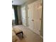 Bedroom with neutral walls featuring 2 closets and natural light at 999 Ashebrooke Ne Way, Marietta, GA 30068