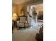 Foyer with staircase is viewable from the living room and dining area, showing an open floorplan at 999 Ashebrooke Ne Way, Marietta, GA 30068