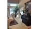 Bright living room showcasing a chest with decor and a decorative palm tree at 999 Ashebrooke Ne Way, Marietta, GA 30068