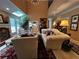 Spacious living room boasting skylights, fireplace, and elegant furnishings at 999 Ashebrooke Ne Way, Marietta, GA 30068