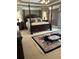 Main bedroom suite featuring a four-poster bed and decorative area rug at 999 Ashebrooke Ne Way, Marietta, GA 30068