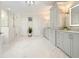 Open bathroom with freestanding tub, glass shower, and double vanity at 107 Owens Mill Place, Canton, GA 30115