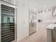 Kitchen with stainless steel refrigerator, large pantry, custom cabinets, and a center island at 107 Owens Mill Place, Canton, GA 30115