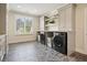 Well-lit laundry room featuring tile floors, washer and dryer units, built-in cabinets and shelves, and a window at 107 Owens Mill Place, Canton, GA 30115