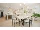 Open concept kitchen and dining area, connecting seamless for easy entertaining and relaxed living at 107 Owens Mill Place, Canton, GA 30115