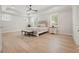 Spacious main bedroom boasts tray ceilings, natural light, and neutral decor at 107 Owens Mill Place, Canton, GA 30115