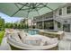 Resort-style backyard with a beautiful pool, spa, and lounge area for ultimate relaxation and entertainment at 107 Owens Mill Place, Canton, GA 30115