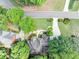 Home with landscaped yard and winding driveway at 1455 Lockridge Dr, Cumming, GA 30041