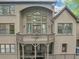 Exterior back view with spacious deck and large windows showcasing the home's architectural details at 1455 Lockridge Dr, Cumming, GA 30041