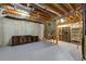 Unfinished basement with visible utilities, storage, and an area to place larger furniture at 1455 Lockridge Dr, Cumming, GA 30041