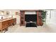 Inviting basement area featuring a built-in entertainment center with detailed molding and a comfortable seating arrangement at 1455 Lockridge Dr, Cumming, GA 30041