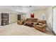 Finished basement offers comfortable seating with leather furniture, perfect for relaxing or entertaining guests at 1455 Lockridge Dr, Cumming, GA 30041