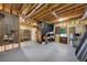Unfinished basement area offers potential for storage, a workbench area and access to utilities at 1455 Lockridge Dr, Cumming, GA 30041