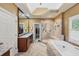 Bathroom featuring a shower, tub, and granite-look countertops at 1455 Lockridge Dr, Cumming, GA 30041