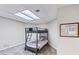 Bedroom with carpet, a bunk bed and a small window at 1455 Lockridge Dr, Cumming, GA 30041