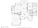 First floor plan featuring kitchen, living room, dining room, garage, laundry, den and primary bedroom spaces at 1455 Lockridge Dr, Cumming, GA 30041
