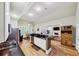 Bright, open kitchen featuring an island with barstool seating and stainless steel appliances at 1455 Lockridge Dr, Cumming, GA 30041