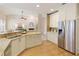 Spacious open kitchen with stainless steel appliances and a peninsula island perfect for entertaining at 710 Eastbourne Ct, Alpharetta, GA 30005