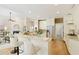 Bright, open kitchen with a breakfast bar, stainless steel appliances, and an easy flow to the living space at 710 Eastbourne Ct, Alpharetta, GA 30005