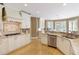 Well-appointed kitchen features granite countertops, stainless steel appliances, and plenty of cabinet space at 710 Eastbourne Ct, Alpharetta, GA 30005