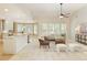 Open concept living room with ample natural light, and adjacent breakfast nook at 710 Eastbourne Ct, Alpharetta, GA 30005