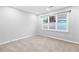 Bedroom featuring a large window and light gray walls at 969 Oak Sw St, Atlanta, GA 30310