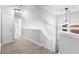 Hallway with carpeted floors and white doors and walls at 969 Oak Sw St, Atlanta, GA 30310