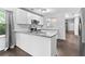 Bright kitchen with breakfast bar, stainless steel appliances and an open layout at 969 Oak Sw St, Atlanta, GA 30310