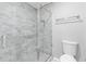 Bathroom featuring a glass-enclosed shower and modern toilet at 969 Oak Sw St, Atlanta, GA 30310