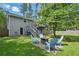 Spacious backyard with a patio, fire pit, lounge chairs and lots of space for activities at 1501 Jamerson Landing, Marietta, GA 30066
