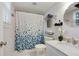 Bathroom featuring a vanity with a marble countertop, floral shower curtain, and chrome fixtures at 1501 Jamerson Landing, Marietta, GA 30066
