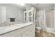 Clean bathroom featuring double sinks, a large mirror, new fixtures, and a shower-tub combination at 1501 Jamerson Landing, Marietta, GA 30066