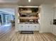 Gourmet Coffee Bar featuring custom shelves and cabinet lighting at 1782 Telfair Chase Way, Lawrenceville, GA 30043