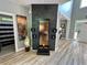Inviting foyer featuring a unique water feature, artwork, and hardwood floors at 1782 Telfair Chase Way, Lawrenceville, GA 30043
